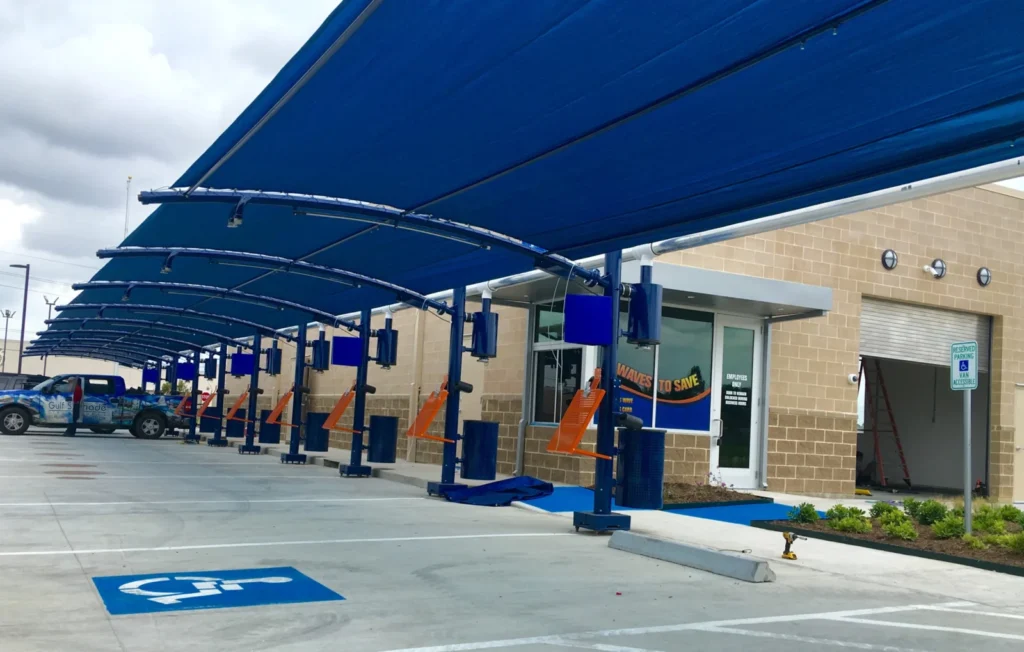 Blue engineered vacuum canopies at Blue Wave Car Wash