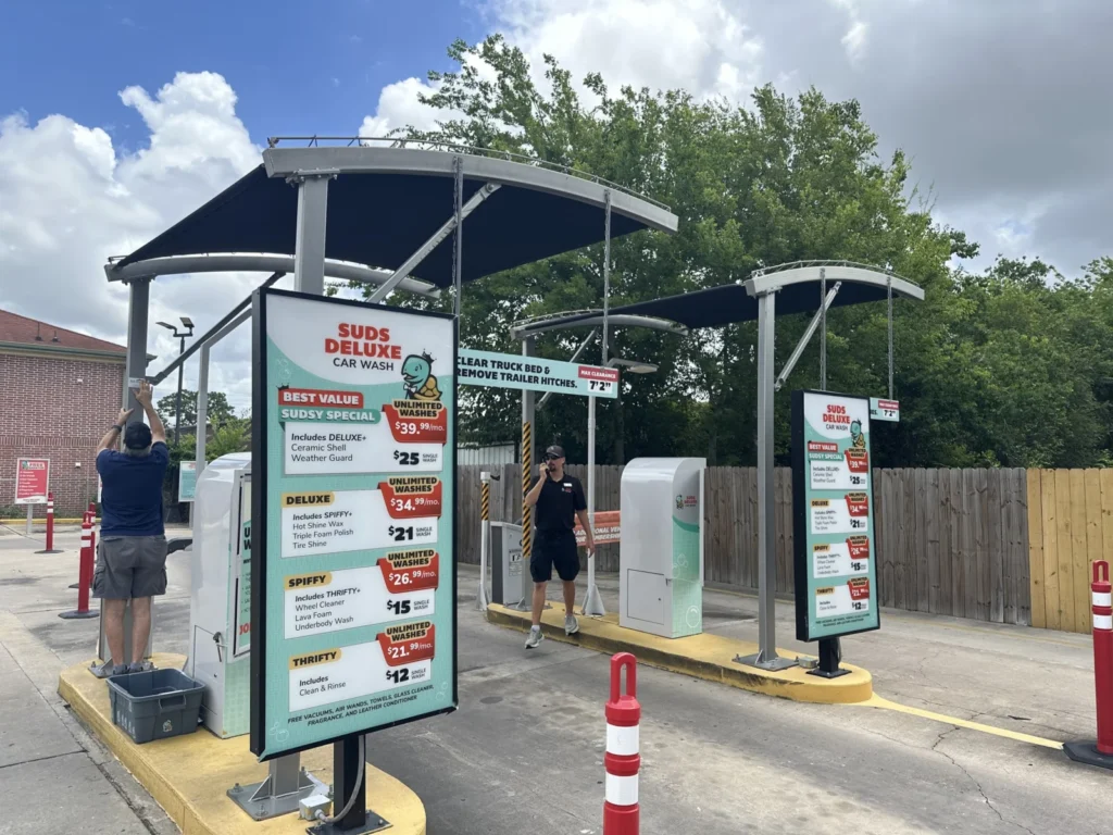 Pay point canopies over car wash payment kiosks