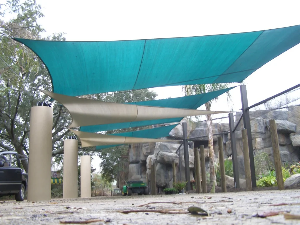 Teal triangular shade sails at the Houston Zoo